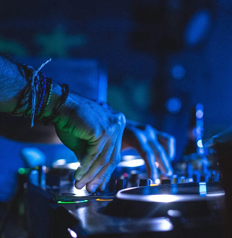 DJ creating mashup with stem splitter